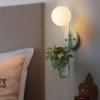 Minimalist Warm Glass Plant Sconce - Thumbnail Image 8