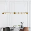 Layered Linear and Pendant Combinations showcasing a modern lighting layout with balanced depth, clean lines, and warm ambient illumination.