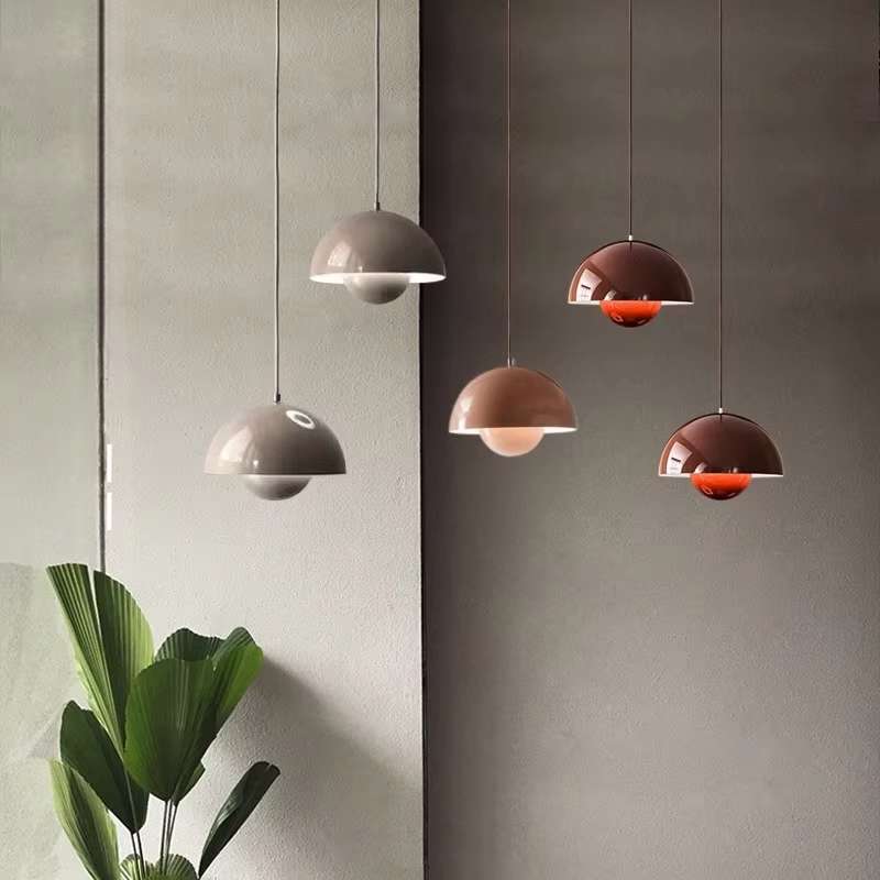 Stylish interior featuring Playful Retro / Designer Pendants with bold colors and creative shapes, adding a unique, artistic lighting accent to modern spaces