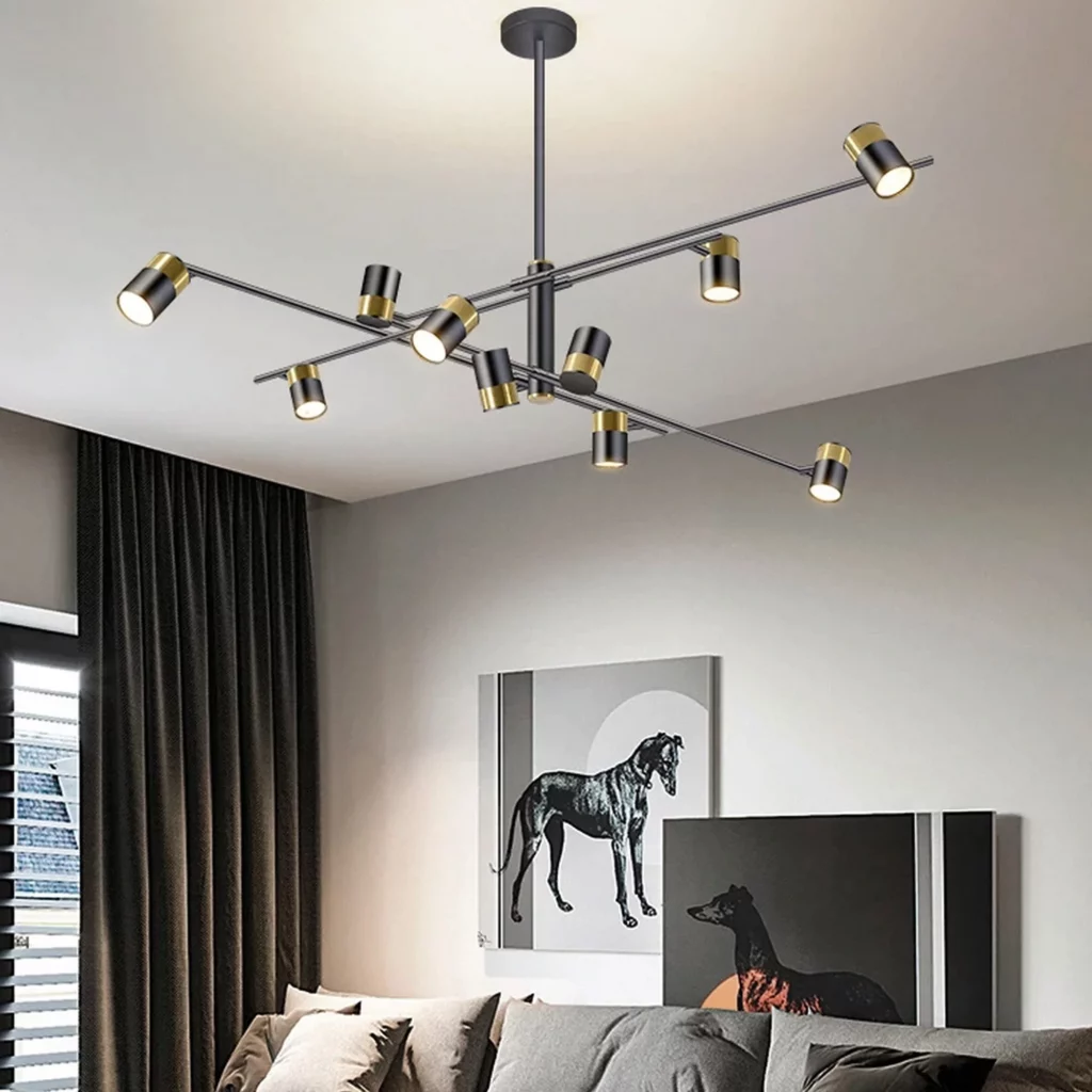 Nordic Design Black Arm Chandelier with multiple adjustable arms and brass-accented lights in a modern living room interior