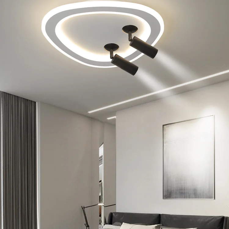 The final image features a Round Shape With Spotlight LED Light that combines soft ambient lighting with functional task lighting. The fixture consists of a large, circular glow-panel mounted flush to the ceiling, paired with two adjustable black cylindrical spotlights.