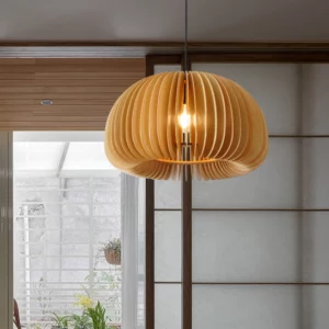 Artistic or handcrafted pendants hanging elegantly, showcasing unique textures, creative shapes, and warm lighting that adds a refined, artisanal charm to the interior space.