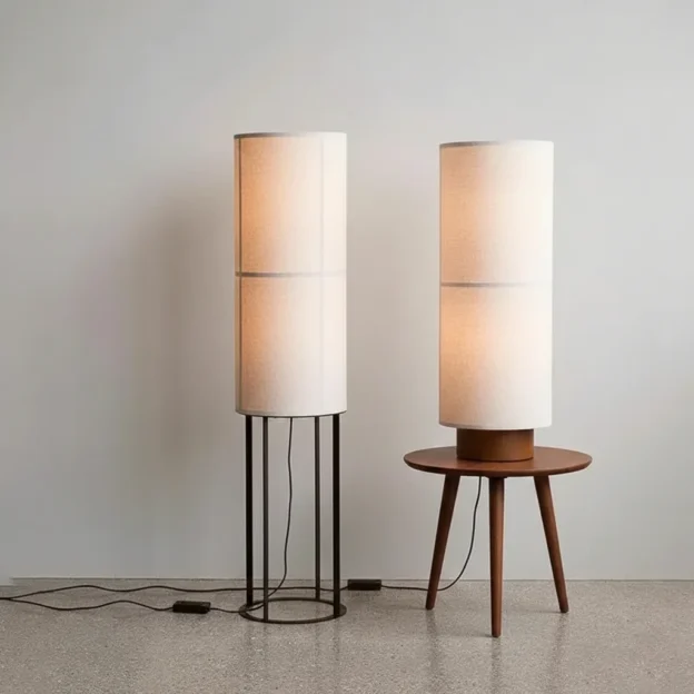 Hashira Table & Floor Lamp shown as cylindrical fabric lamps on a stand and small table, emitting soft Japandi-style ambient light