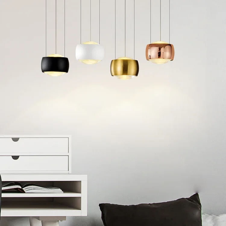 Contemporary interior showcasing Ring/Halo Pendants with soft glowing circular forms, adding a premium, modern lighting accent to elegant living and dining spaces