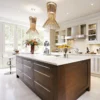 Modern white kitchen with island and wooden cabinets, featuring Allegretto Vivace Suspension lights adding elegant ambient lighting